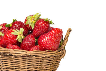 Strawberries and basket isolated on a white background.