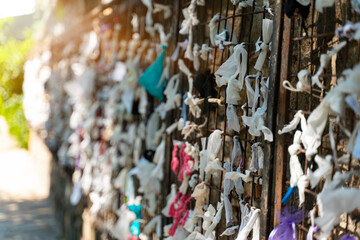Fototapeta na wymiar The wishing wall at House of Virgin Mary in Turkey, believed by some pilgrims to be miraculous.