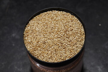 Organic natural Til Gul OR Sesame seeds over white background