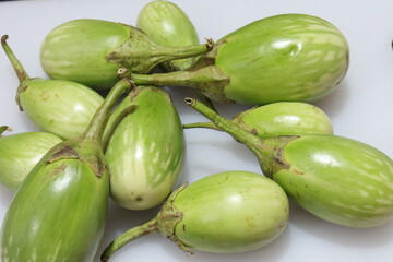 Fresh Raw Sliced green colour Eggplant Brinjal or Eggplant isolated on white background 