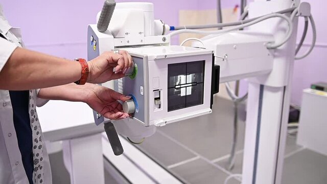 Medical active light X-ray machine operating in a hospital clinical lab, low angle shot