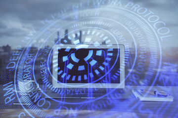 Double exposure of computer and technology theme hologram. Concept of freelance work.