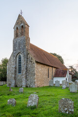 The exterior Of St Mary's church in Chidham West Sussex, UK A typical English church