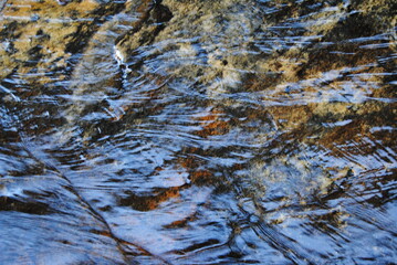 The view to the valley with the trees and the waterfall in the Blue Mountains national park in Australia