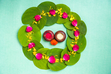 Indian festival dussehra , green leaf, rice and flowers