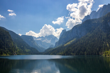 Naklejka na ściany i meble beautiful mountain lake on a sunny day in the alps of austria