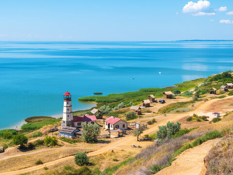 khutor Merzhanovo, Rostov region, Russia - August 3, 2020: lighthouse on the shore of the Sea of Azov on a sunny day