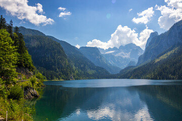 Fototapeta na wymiar beautiful mountain lake on a sunny day in the alps of austria