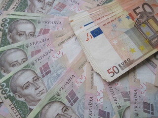 banknotes of different countries for the exchange of money from 500 hryvnia to 50 euros