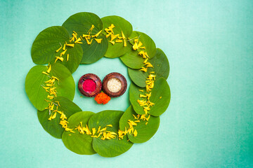 Indian festival dussehra , green leaf, rice and flowers