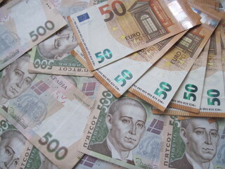 banknotes of different countries for the exchange of money from 500 hryvnia to 50 euros