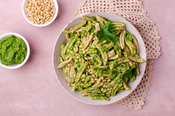 Traditional pasta with green sauce