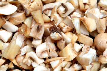 Blanched Mushroom in a strainer.