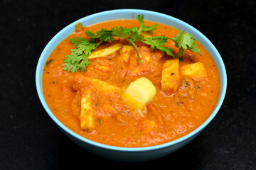 Paneer Butter masala Served in a Bowl