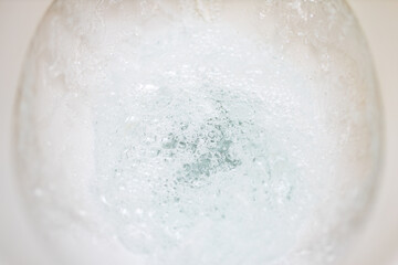 white bubbles splashing water jacuzzi in bathroom