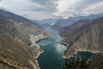 Mountain range with azure water flowing