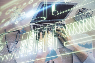 Science hologram with man working on computer on background. Concept of study. Double exposure.