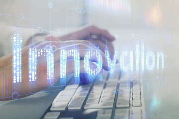 Multi exposure of tech drawings with man working on computer background. Concept of innovation.