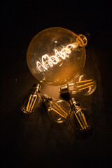 light bulbs on dark background idea and innovation