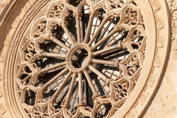 Close-up of the rose window mabe by Leccese sandstone, above the entrance of the Cathedral of Otranto, province of Lecce, Salento, Puglia, Southern Italy