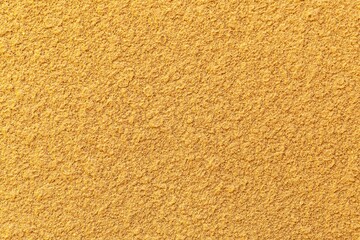 Rough patterned brown cement wall texture and seamless background