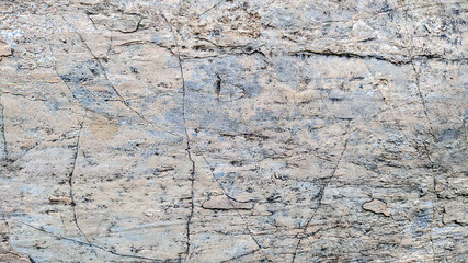 Stone texture abstract background. Detail of natural material gray granite old rock wall surface with grunge nature rough pattern can use for wallpaper backdrop and any design