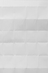 White crumpled paper background.
