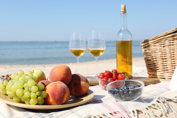 Food and wine on beach. Summer picnic