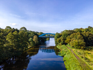 Fototapeta na wymiar The Hartford Bridge, or Blue Bridge, is a single-span road bridge crossing the River Weaver at Hartford, Cheshire in England