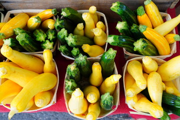 Yellow and green zucchini summer squash at the farmers market