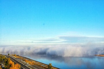 Fototapeta na wymiar Fog over the river