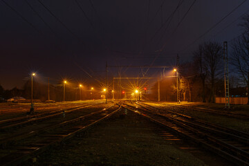 Empty railroad station at night time