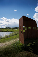 Fototapeta na wymiar A bird watching pavilion for eco tourists in Fish Creek Park Alberta Canada