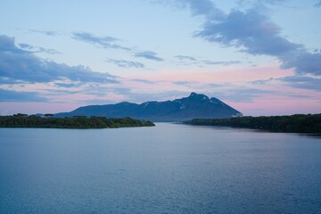 Sunset on lake Sabaudia with a view on mount Circeo, Circeo National Park, Italy