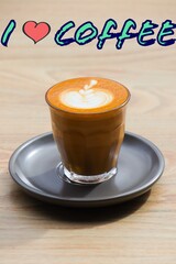 Coffee Latte cup on brown background. The Written words, I Heart coffee