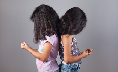 Two agressive girls having argue fight.
