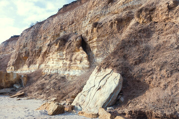 Rockslide. Mountain landslide in an environmentally hazardous area. Large cracks in earth, descent...