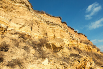 Rockslide. Mountain landslide in an environmentally hazardous area. Large cracks in earth, descent...