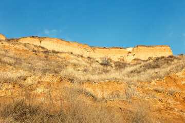 Rockslide. Mountain landslide in an environmentally hazardous area. Large cracks in earth, descent...
