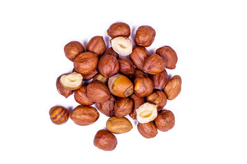 Peeled brown hazelnut heap isolated on white background.