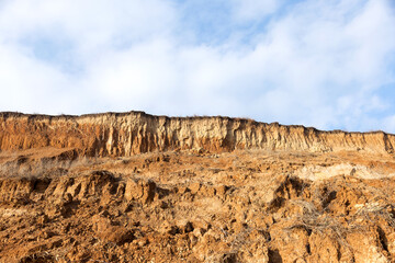 Rockslide. Mountain landslide in an environmentally hazardous area. Large cracks in earth, descent...