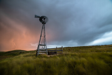 Naklejka premium Stormy Skies and Windmill