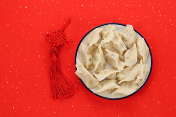 dumplings in the background of Chinese Red