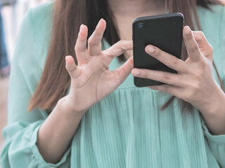 close up of women using smartphone, in the business technology concept.