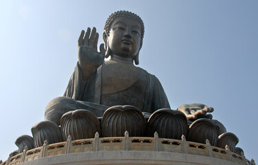 The Big Buddha or Tian Tan Buddha  on Lantau Island, Hong Kong, China. The Buddha Shakyamuni statue is at Ngong Ping near Po Lin Monastery on Lantau. Close up view of the Buddha statue.