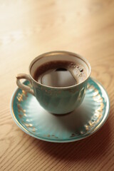 A cup of coffee on the table