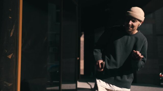 dance loop funny caucasian man dancing in street having fun celebrating with funky looping dance 4k