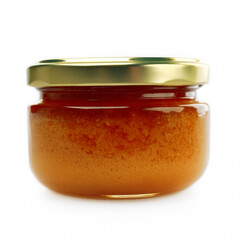 Close-up glass jar of honey on white background