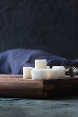 sugar cubes closeup on a dark background backlit 