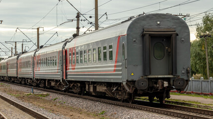 the last car of the outgoing train from the station